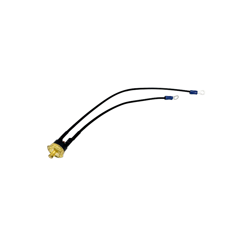 Brass thermostat with two black wires and blue ring terminal connectors, shown on a white background. Aqua Hot ELE-000-616-FRU 215°F high limit VAC thermostat with ring terminals, for motorhome and RV heating systems.